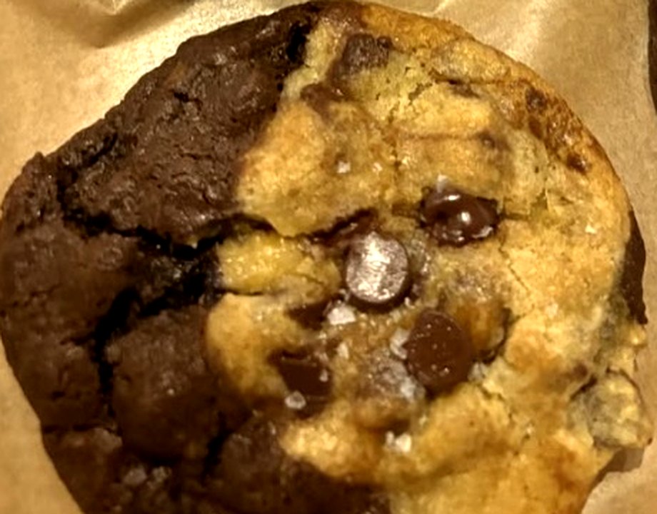 A marbled chocolate and brown butter chocolate chip cookie with flaky salt